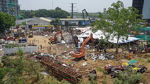 Debris at the site after a 100-foot tall illegal billboard fell on a petrol pump on Monday due to rains and duststorms in the Ghatkopar area of Mumbai, Wednesday, May 15, 2024.