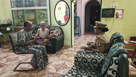 Mayiladuthurai Inspector S Supriya interacting with elderly citizens and checking on their safety on Saturday