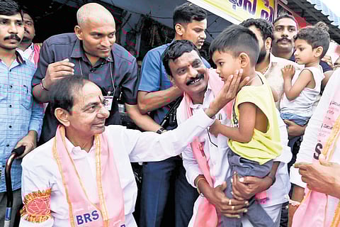 BRS chief K Chandrasekhar Rao interacts with people at a tea stall in Nizamabad