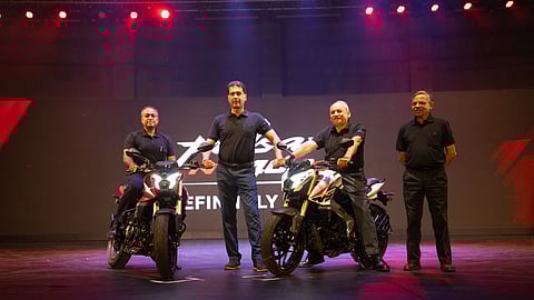 Tax on two-wheelers too high, market over-regulated: Bajaj