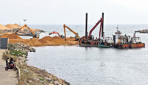 Dredging activities are going on at a snail’s pace at Muthalapozhi harbour mouth in Thiruvananthapuram