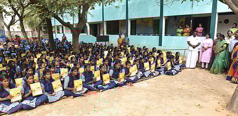 Minister Sivasankar overseeing distribution of study material in Kunnam
