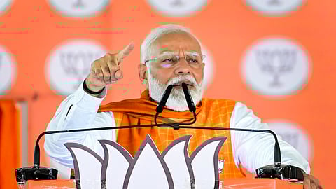 Prime Minister Narendra Modi addresses a public meeting for Lok Sabha polls in Khargone, Tuesday, May 7, 2024.