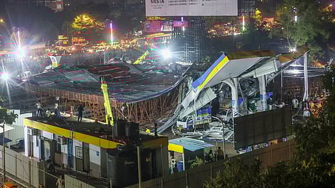 A damaged petrol pump after a huge iron hoarding collapsed on it due to strong winds and heavy rain, at Ghatkopar in Mumbai, Monday, May 13, 2024.