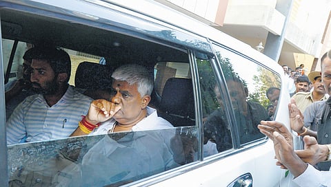 Holenarasipur JDS MLA HD Revanna departs from the residence of his father and former prime minister HD Deve Gowda, after his release on bail from Parappana Agrahara Central Prison, in Bengaluru on Tuesday