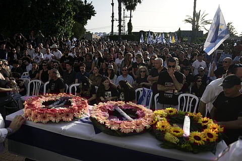 Israelis attend the funeral of Hanan Yablonka, who was killed during Hamas' Oct. 7, 2023 attack and whose body was taken into Gaza, during his funeral in Tel Aviv.