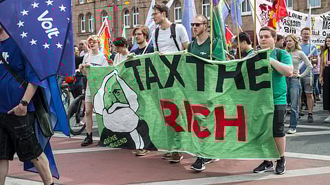 Demonstrators participate on a May Day march, in Nuremberg, Germany.