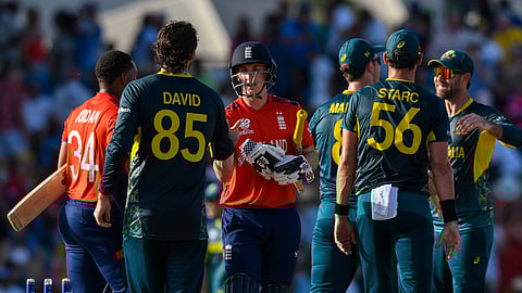 England's Harry Brook (3rd L) congratulates Australia's Tim David (2nd L) on Australia's victory during the ICC men's Twenty20 World Cup 2024 group B cricket match between Australia and England at Kensington Oval in Bridgetown, Barbados, on June 8, 2024.