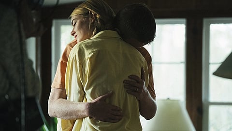 This image released by Searchlight Pictures shows Emma Stone and Jesse Plemons in a scene from "Kinds of Kindness"