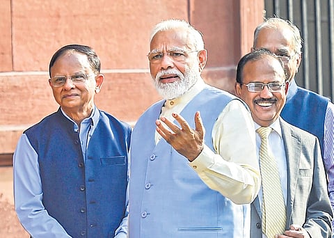 PM Narendra Modi arrives for a Cabinet meeting at South Block in New Delhi.