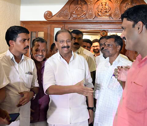 K Sudhakaran returning after meeting K Muraleedharan at Muraleedharan's residence in Kozhikode.