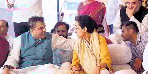 Water Minister Atishi, AAP RS MP Sanjay Singh at protest site