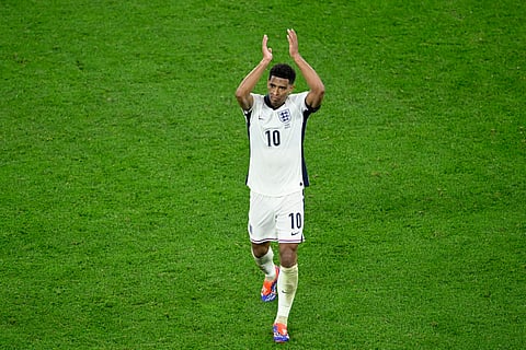 England's midfielder Jude Bellingham greets the fans as he leaves the pitch during the UEFA Euro 2024 Group C football match between Serbia and England on June 16, 2024.