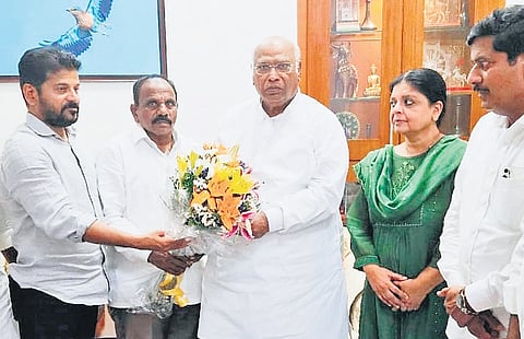 AICC chief Mallikarjun Kharge & CM A Revanth Reddy in New Delhi with Chevella MLA Kale Yadaiah on Friday. Yadaiah is the sixth BRS legislator to join the Congress.
