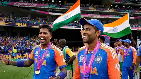 India's Hardik Pandya, left, and teammate Suryakumar Yadav celebrate after India won the ICC Men's T20 World Cup final cricket match against South Africa at Kensington Oval in Bridgetown, Barbados, Saturday, June 29, 2024.