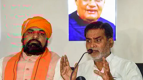 Bihar Deputy CM Samrat Chaudhary (L) with BJP Patliputra candidate Ram Kripal Yadav during press conference at the party office, in Patna, Sunday, June 2, 2024.