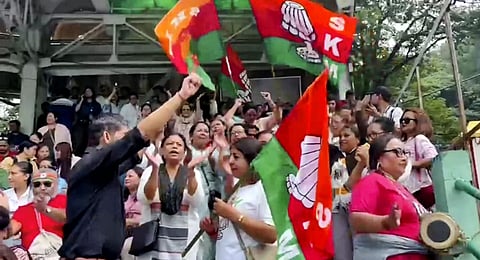 Sikkim Krantikari Morcha (SKM) members celebrate their lead in the Assembly polls, outside a counting centre, in Gangtok, Sunday, June 2, 2024.