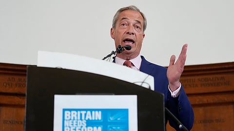 Nigel Farage, leader of Britain's Reform Party, speaks during a press conference in Westminster, London, Friday, June 14, 2024, while on the General Election campaign trail.