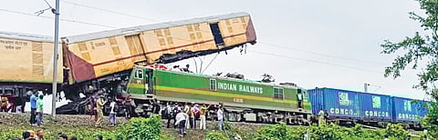 Rescue work underway after a speeding goods train rammed into the stationary Kanchanjunga Express near Rangapani railway station in West Bengal on Monday.