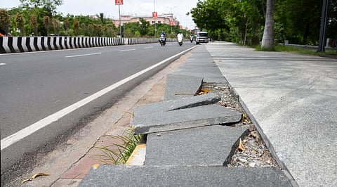 Broken tiles of walkers' track at Anna Nagar in Tiruchy on Saturday