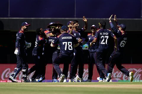 United States' Steven Taylor, third left, celebrates with teammates after taking the catch to dismiss Pakistan's Mohammad Rizwan during the ICC Men's T20 World Cup cricket match on June 6, 2024.