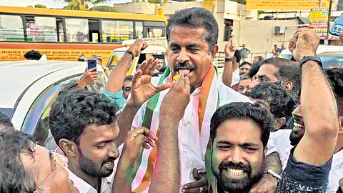 Adoor Prakash with his supporters after winning the Lok Sabha election.