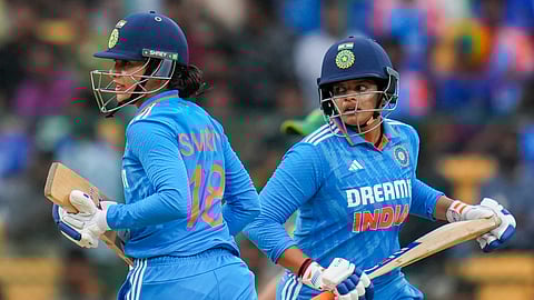 Indian batters Smriti Mandhana and Shafali Verma run between the wickets during the third women's ODI cricket match between India and South Africa at M Chinnaswamy Stadium, in Bengaluru.