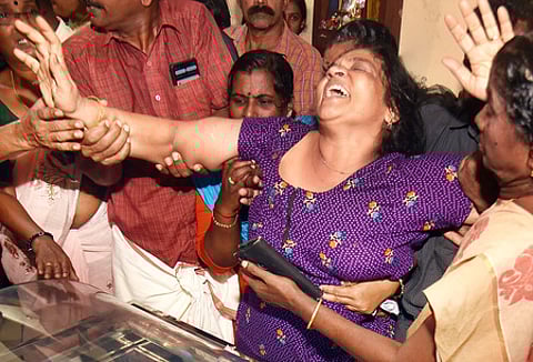 Mother of Akash S Nair of Mudiyoorkonam in Pandalam, who died in Kuwait building fire, are inconsolable when his mortal remains were brought to his native town.