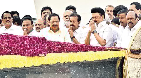 Chief Minister MK Stalin and other DMK leaders paying floral tributes at the memorial of DMK patriarch M Karunanidhi at the Marina in Chennai on the occasion of his 101st birth anniversary on Monday