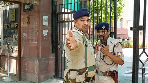 Police personnel outside the National Museum after it received a bomb threat via e-mail, in New Delhi, Wednesday, June 12, 2024.
