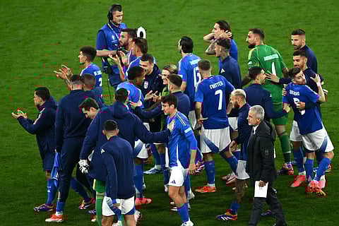 Italy's players celebrate after winning the UEFA Euro 2024 Group B football match between Italy and Albania at the BVB Stadiun in Dortmund on June 15, 2024.
