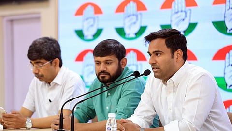 National Students' Union of India (NSUI) National President Varun Choudhary addresses a press conference with Congress leader Kanhaiya Kumar and Congress Secretary Vineet Punia, at the party headquarters, in New Delhi on Friday.