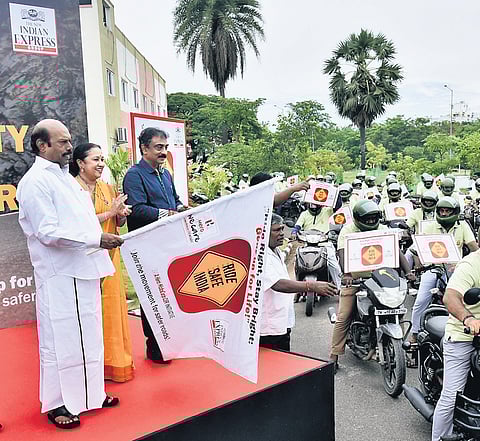The Acting Chief Justice R Mahadevan flagging off TNIE road safety campaign motorcycle rally on the Madras High Court campus