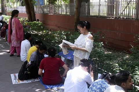 Aspirants outside an examination centre before the Union Public Service Commission Civil Services Preliminary Examination, in New Delhi.