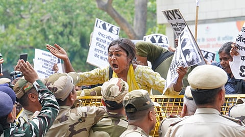 Students protest over the irregularities surrounding the UGC-NET and NEET-UG examinations in New Delhi, Thursday, June 20, 2024.