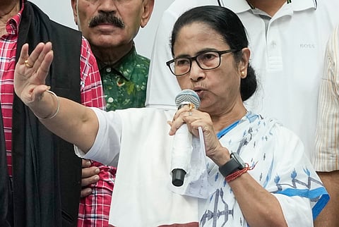 West Bengal Chief Minister and TMC Supremo Mamata Banerjee interacts with the media after a meeting with newly elected MPs of the party at her Kalighat residence, in Kolkata, Saturday, June 8, 2024.