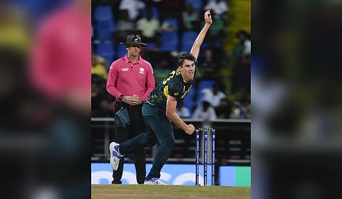 Australia's Pat Cummins bowls during the ICC Men's T20 World Cup cricket match between Australia and Bangladesh in North Sound, Antigua and Barbuda, Thursday, June 20, 2024.