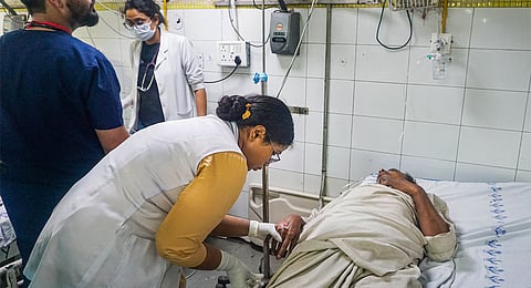 A patient admitted due to heat stroke and exhaustion undergoes treatment at LNJP hospital, in New Delhi, Wednesday, June 19, 2024. Due to prevailing heatwave conditions, hospitals in Delhi-NCR are seeing an influx of patients with complaints of heat stroke and exhaustio