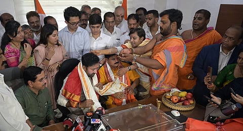 G. Krishna Reddy offer puja before assuming charge as Coal and Mines minister at Shastri Bhawan in New Delhi on Thursday.