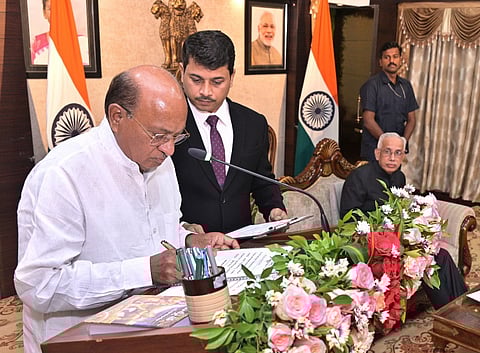 TDP senior MLA Gorantla Butchaiah Chowdary takes oath as Pro-tem Speaker in the presence of Governor S Abdul Nazeer at Raj Bhavan.