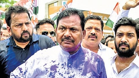 OPCC president Sarat Pattanayak covered in ink on Friday