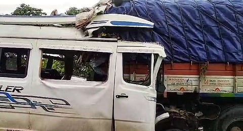 The tempo traveller and the truck on NH 48 near Haveri