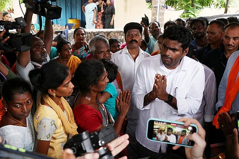 TN BJP State President K Annamalai attends the funeral of a victim of the hooch tragedy.