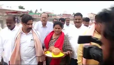 A BJP team on way to Srimandir to invite Lord Jagannath to the event