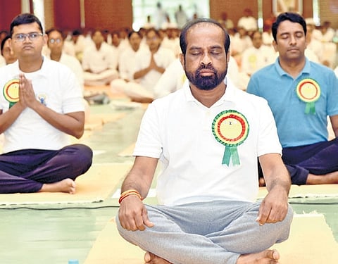 Minister for Health Y Satya Kumar Yadav taking part in the International Yoga Day celebrations