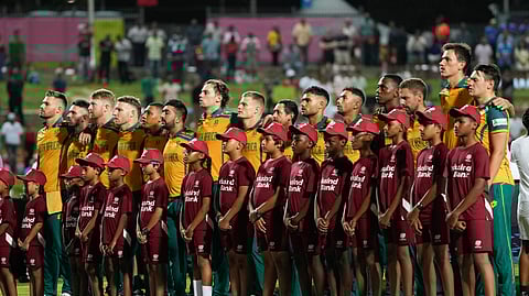 South African players sing their national anthem ahead of the men's T20 World Cup semifinal cricket match against Afghanistan.