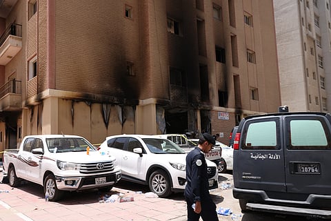 A picture shows a building that was engulfed by fire in Kuwait City on June 12, 2024.