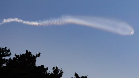 Contrails believed to be created by a North Korean missile are observed over seas off Yeonpyeong Island, South Korea, Wednesday, June 26, 2024.