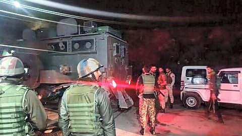 Security personnel during a cordon and search operation after an encounter with terrorists at Saida Sukhal village, in Kathua district.