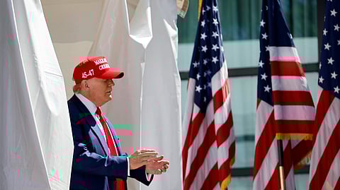 Republican presidential candidate former President Donald Trump enters at a campaign event Tuesday, June 18, 2024, in Racine, Wisconsin.